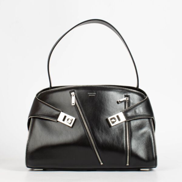 Shop the authentic Ferragamo Black Multi Zip Medium Hug Soft Bag on Replica Shoes  